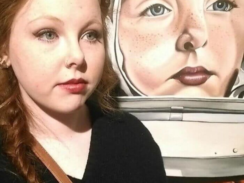 A woman and an art exhibit that look alike