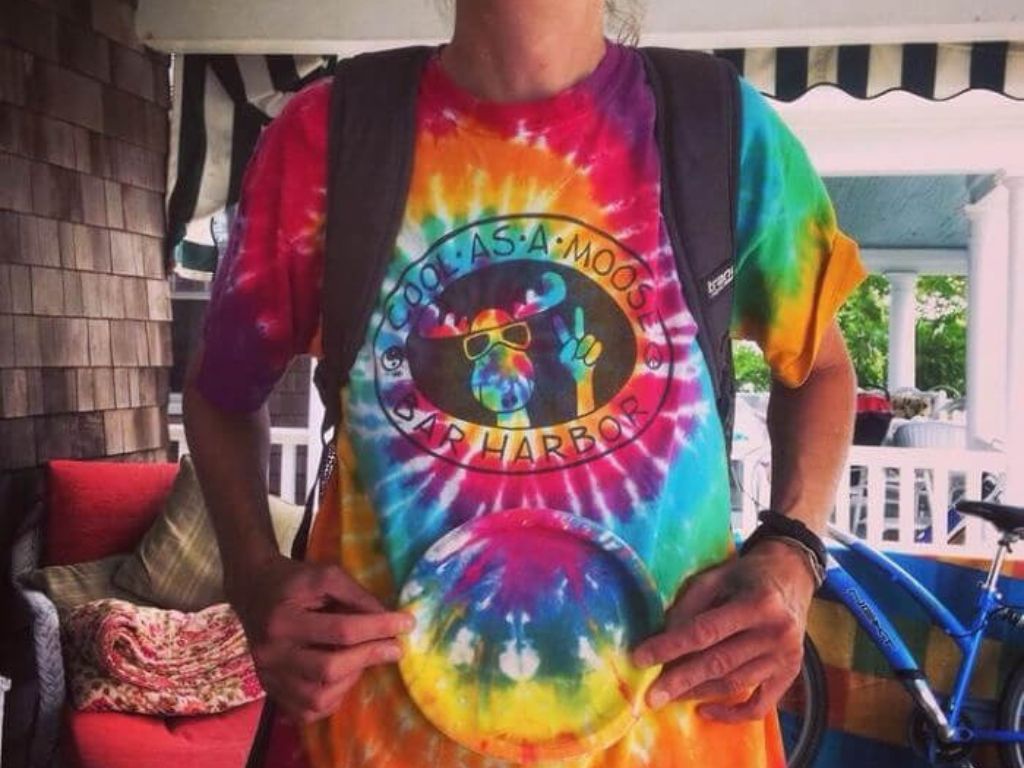 Tye-dye print on a shirt and plate that match