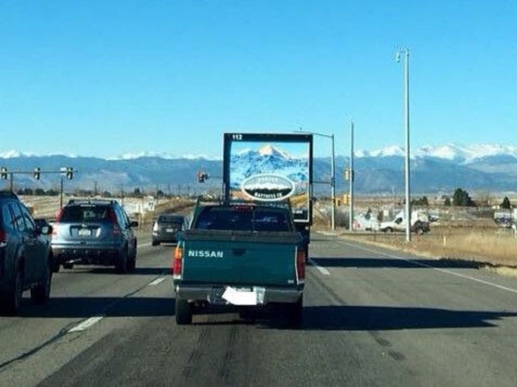 A glacier mural on the back of a truck 