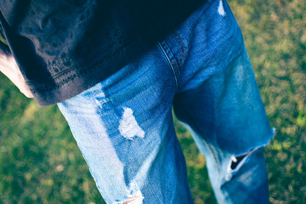 a person's legs and jeans