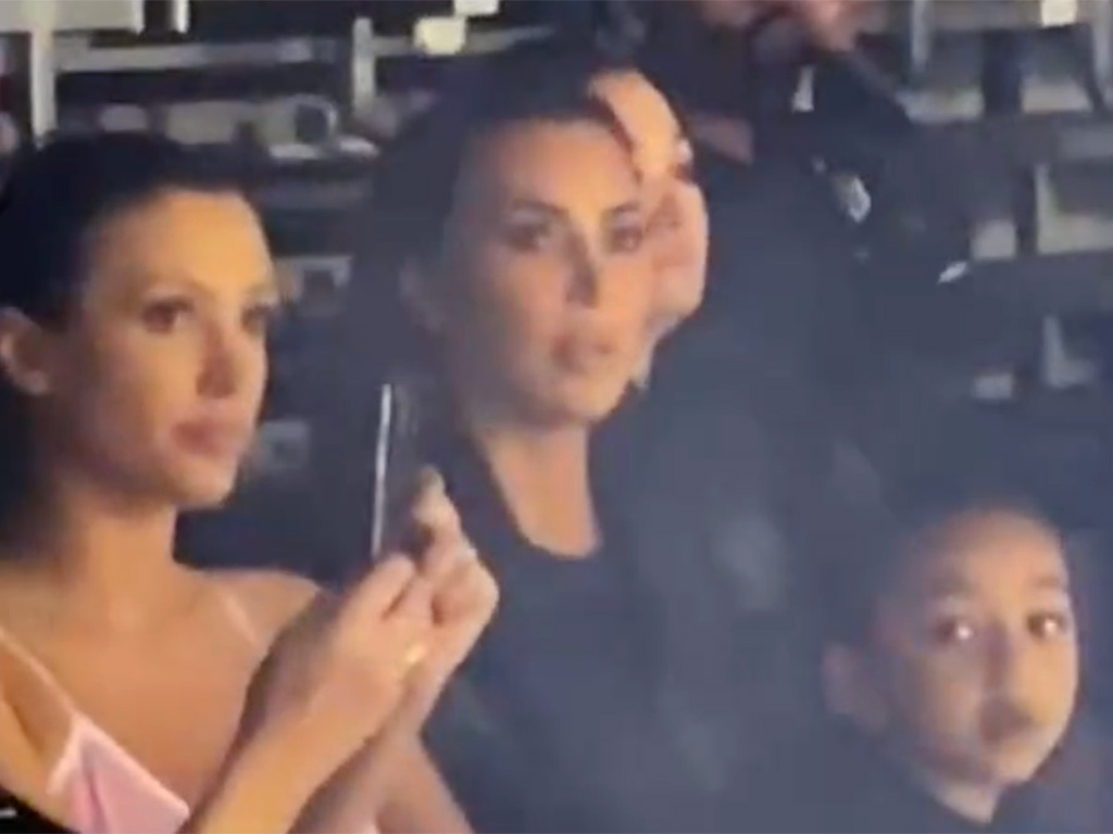 Bianca Censori, Kim Kardashian and one of Kim's children at Ye's album listening party.