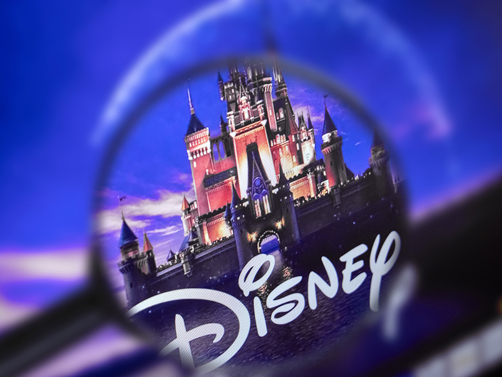 Disney logo behing a magnifying glass