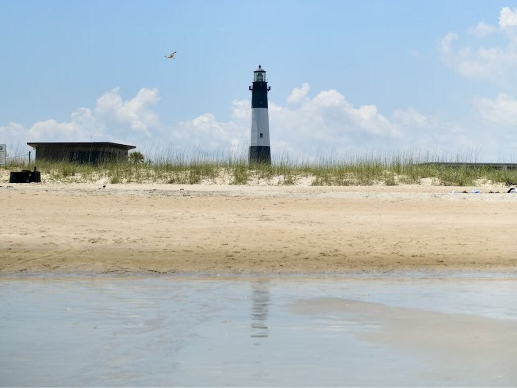 A lighthouse on the beach in Tybee Island, Georgia