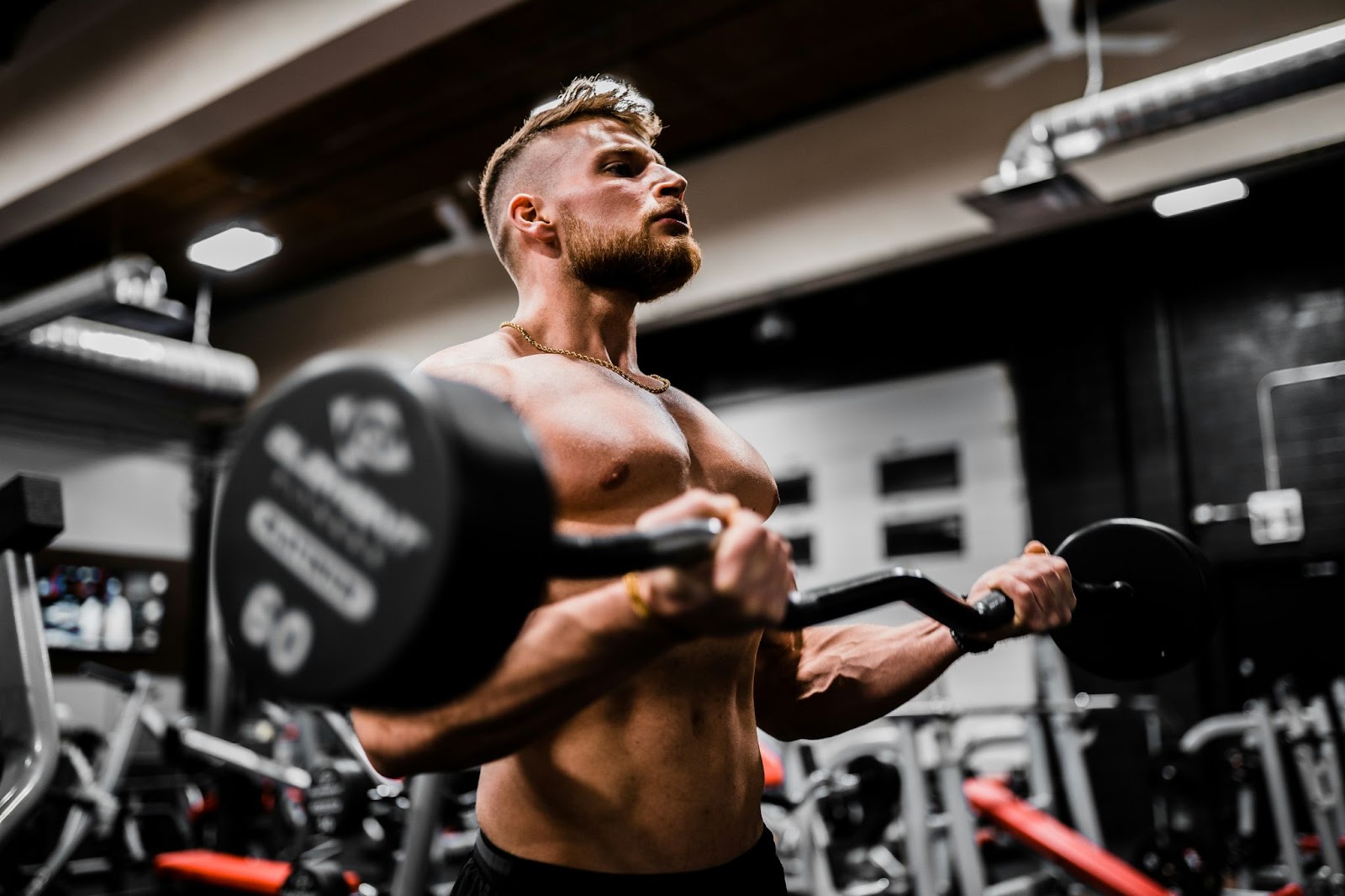 Man lifting weights in a gym