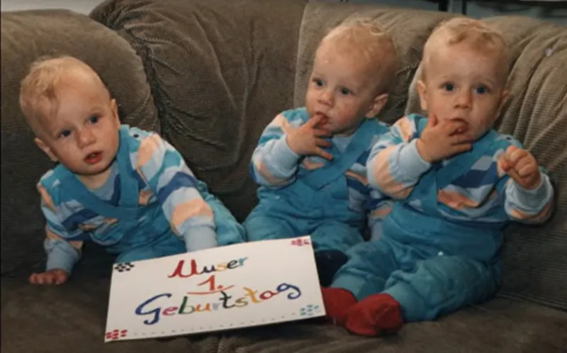 Three triplets in their annual birthday photo