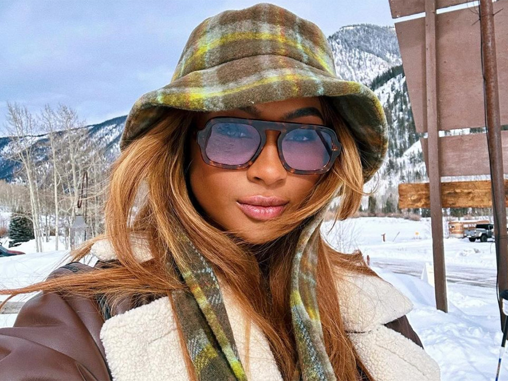 Kayla Nicole wearing sunglasses in the snow