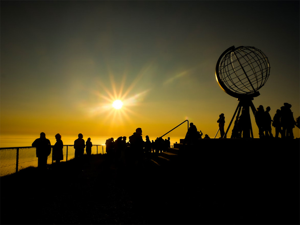 A crowd around the fence at North Cape in Scandinavia 