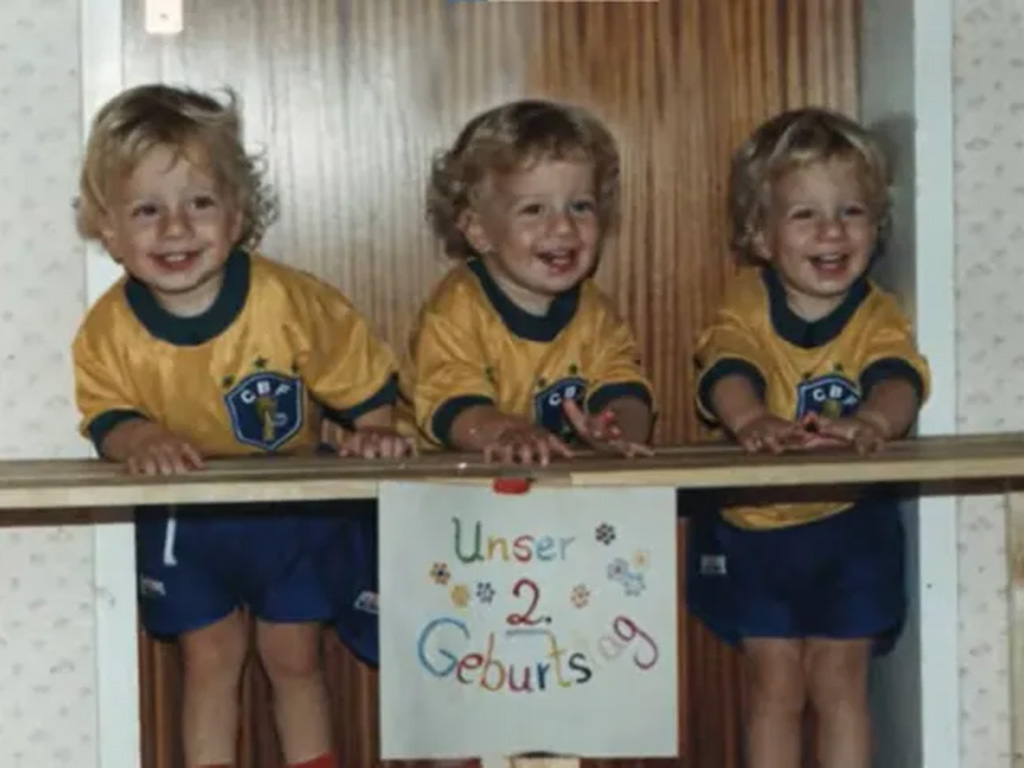 Three triplets in their annual birthday photo