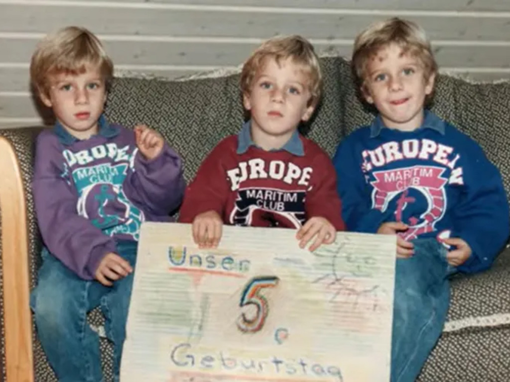 Three triplets in their annual birthday photo