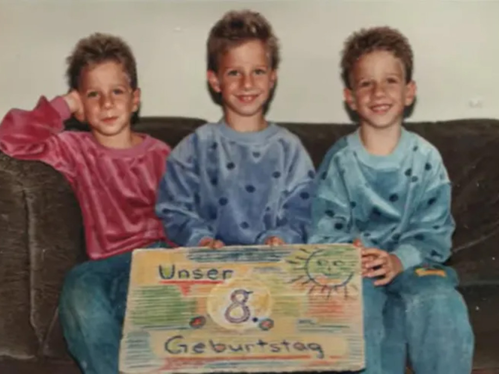 Three triplets in their annual birthday photo