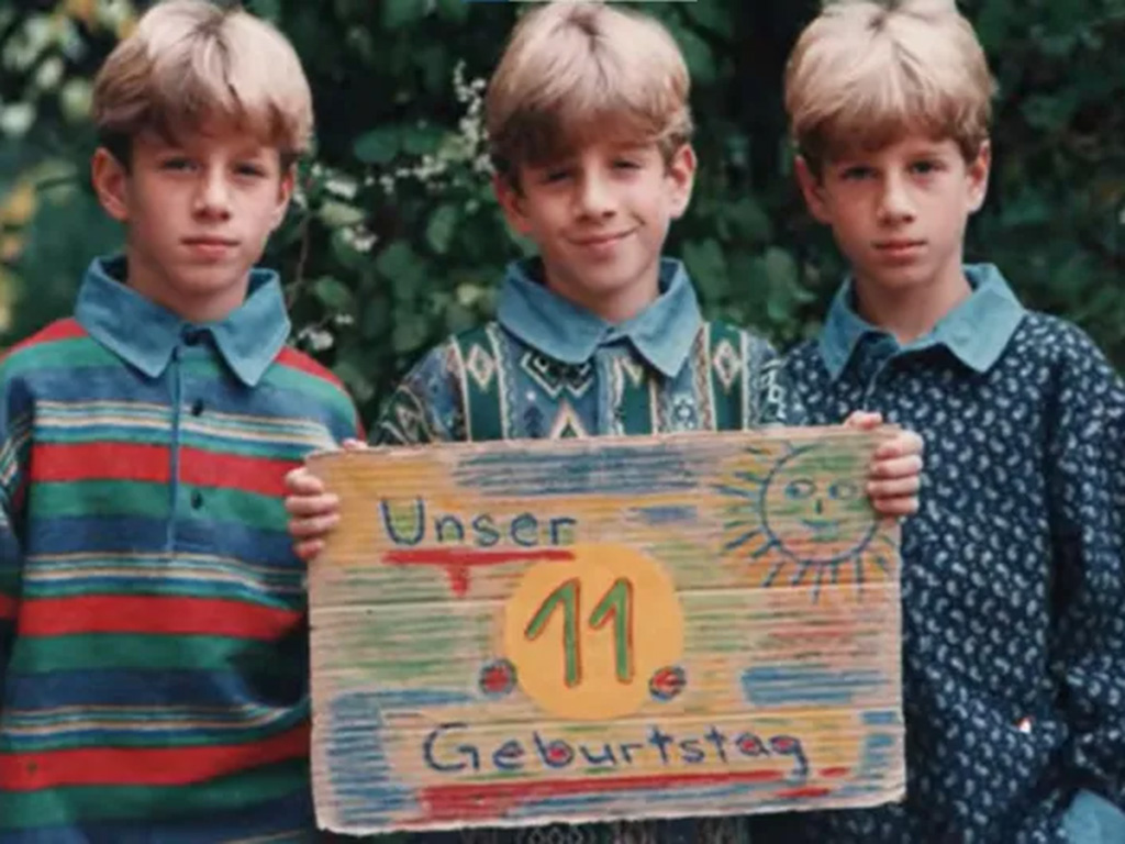 Three triplets in their annual birthday photo