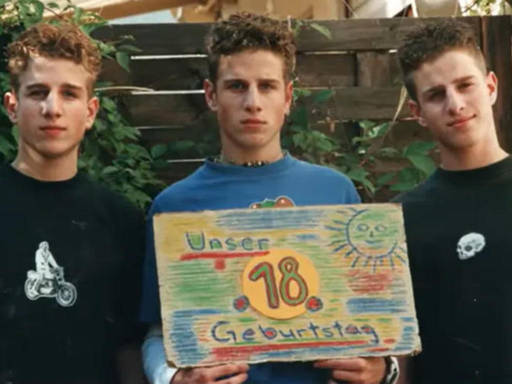 Three triplets in their annual birthday photo