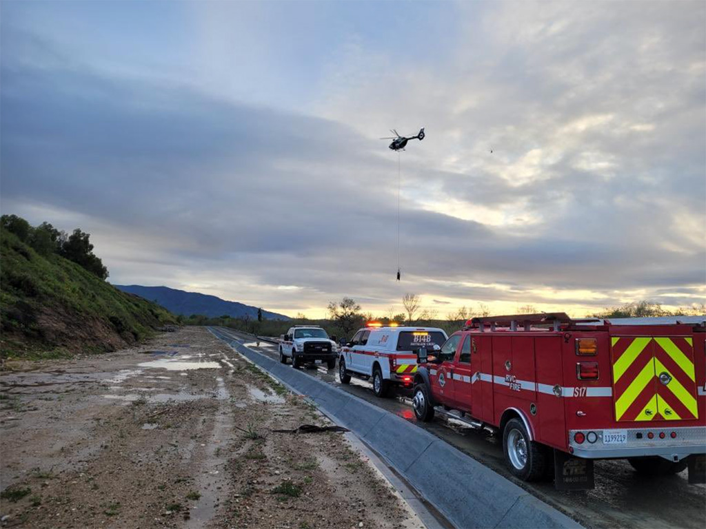 Fire department helicopter gathering water