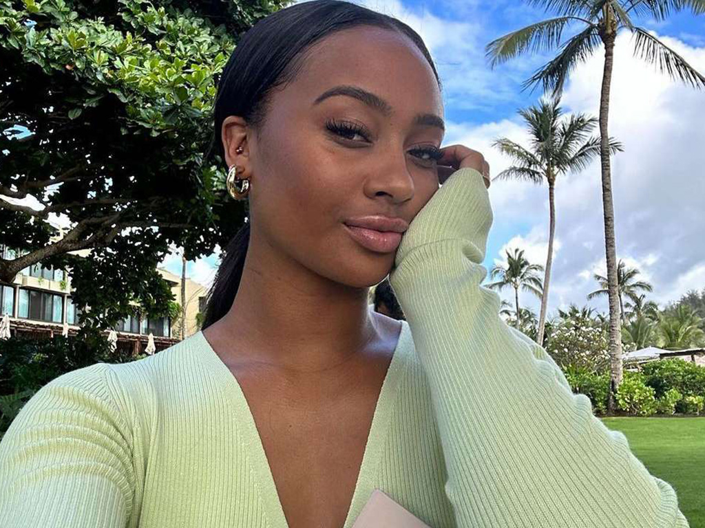 Kayla Nicole wearing a green top in an Instagram photo