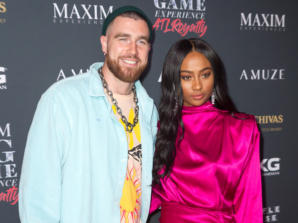 Travis Kelce and Nicole Bailey on a red carpet together