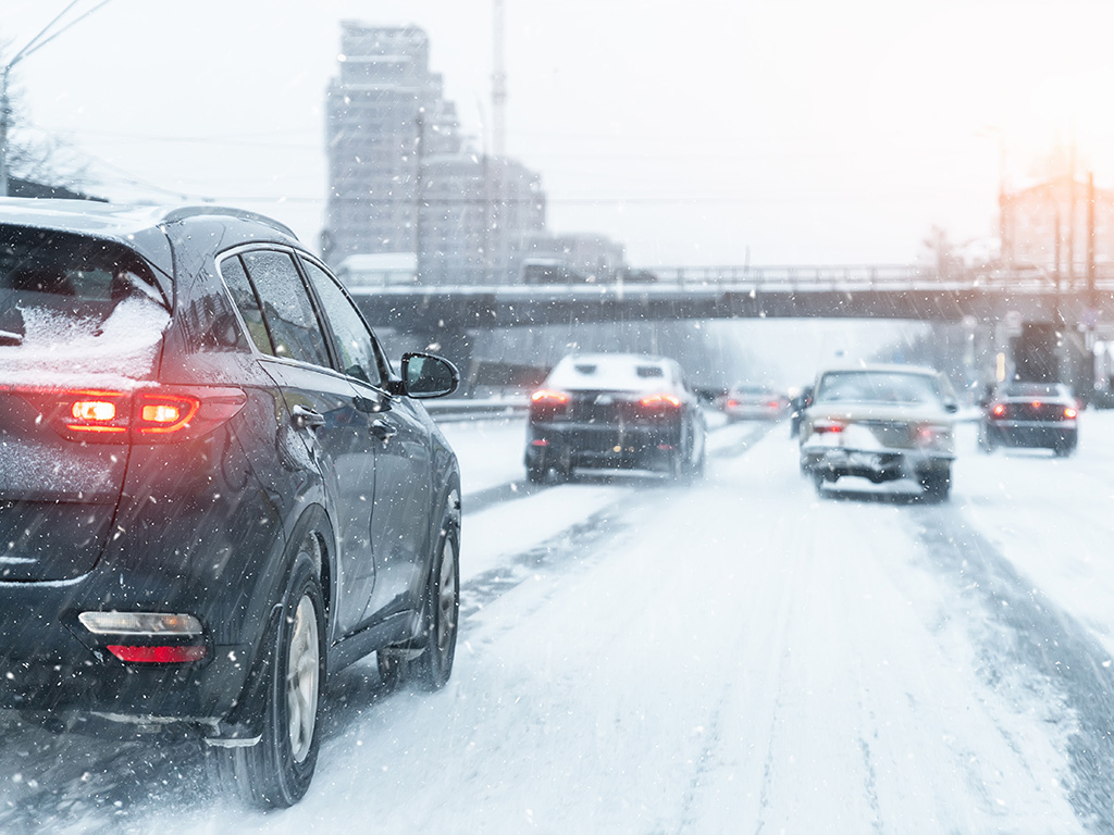 Cars on the road in the winter