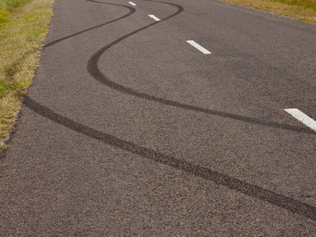 Skid lines in the road