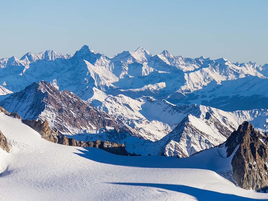 Ski resort Chamonix Mont Blanc. The mountain is the highest in the Alps and the European Union. Alpine mountains range landscape in beauty French, Italian and Swiss ALPS seen from Aiguille du Midi
