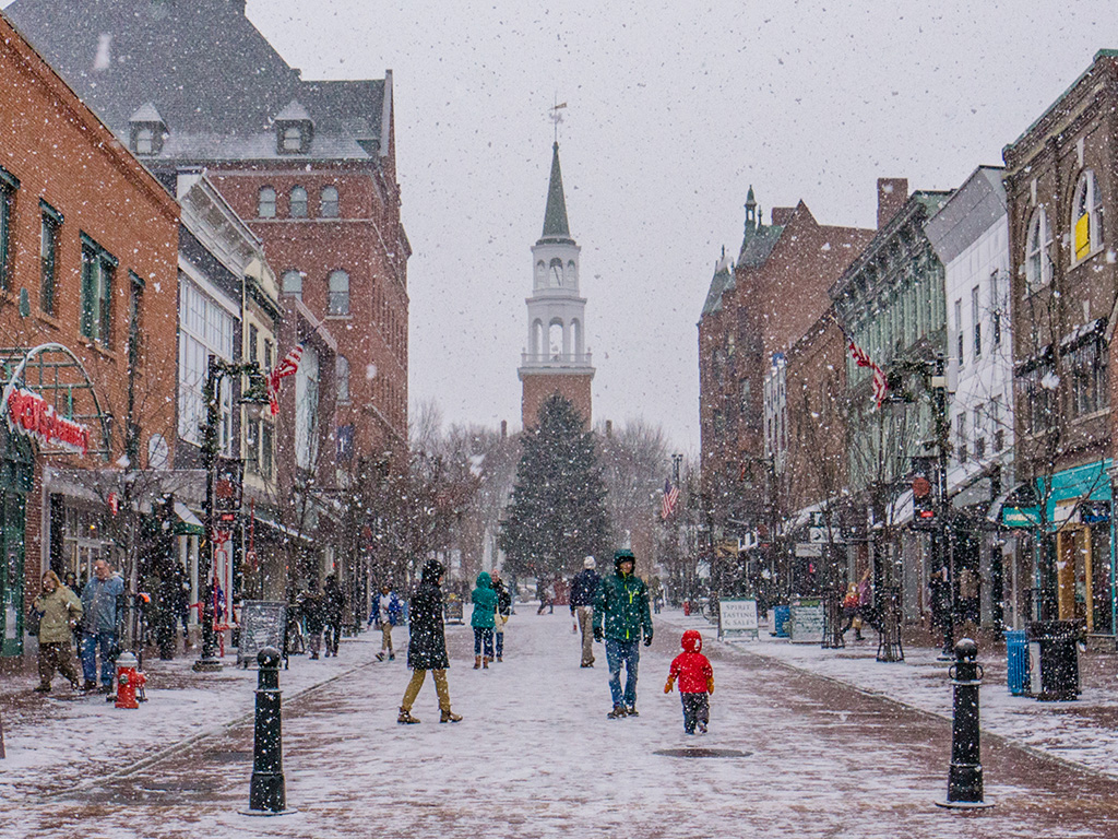 "Burlington, Vermont/ USA - December 25,2018 : sudden snow flurries during last minute shopping on Christmas Eve "