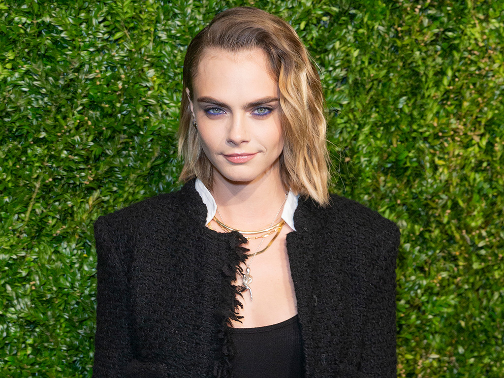 Cara Delevingne wearing Chanel attends the Chanel 14th Annual Tribeca Film Festival Artists Dinner at Balthazar