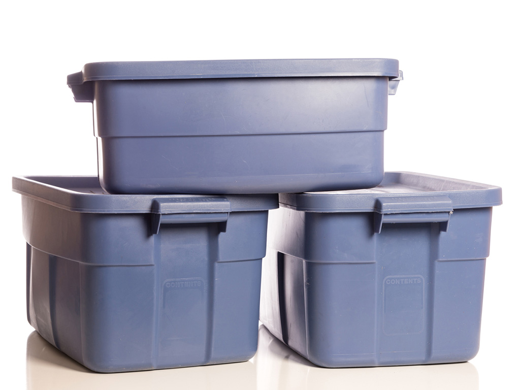 Three plastic storage bins