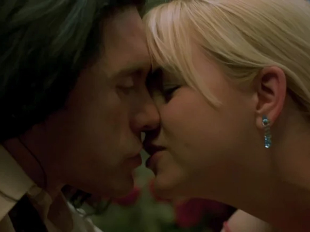 Tommy Wiseau and Juliette Danielle in "The Room"