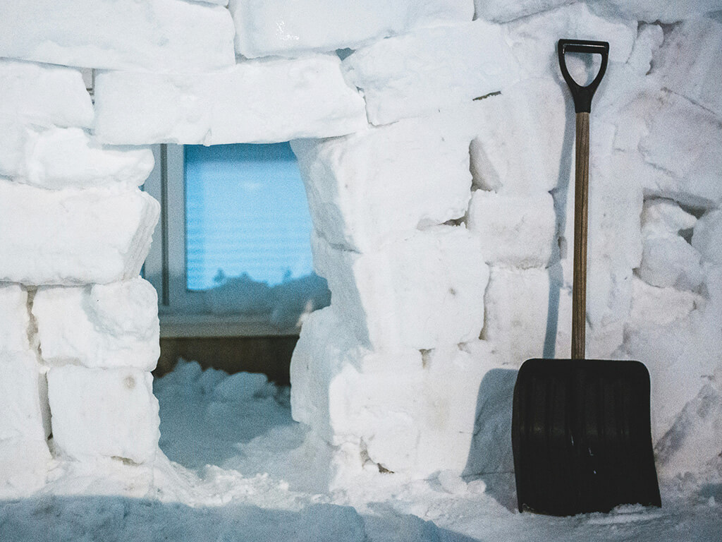 Shovel outside of an igloo 