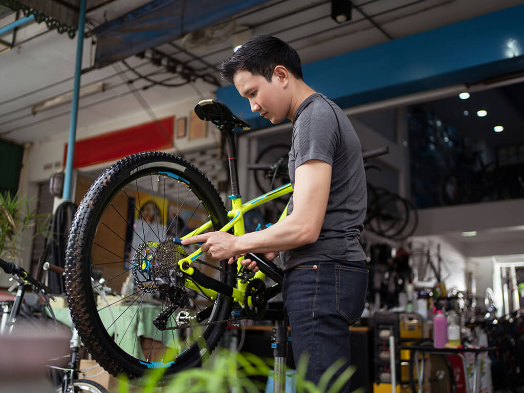 Man working on his bike