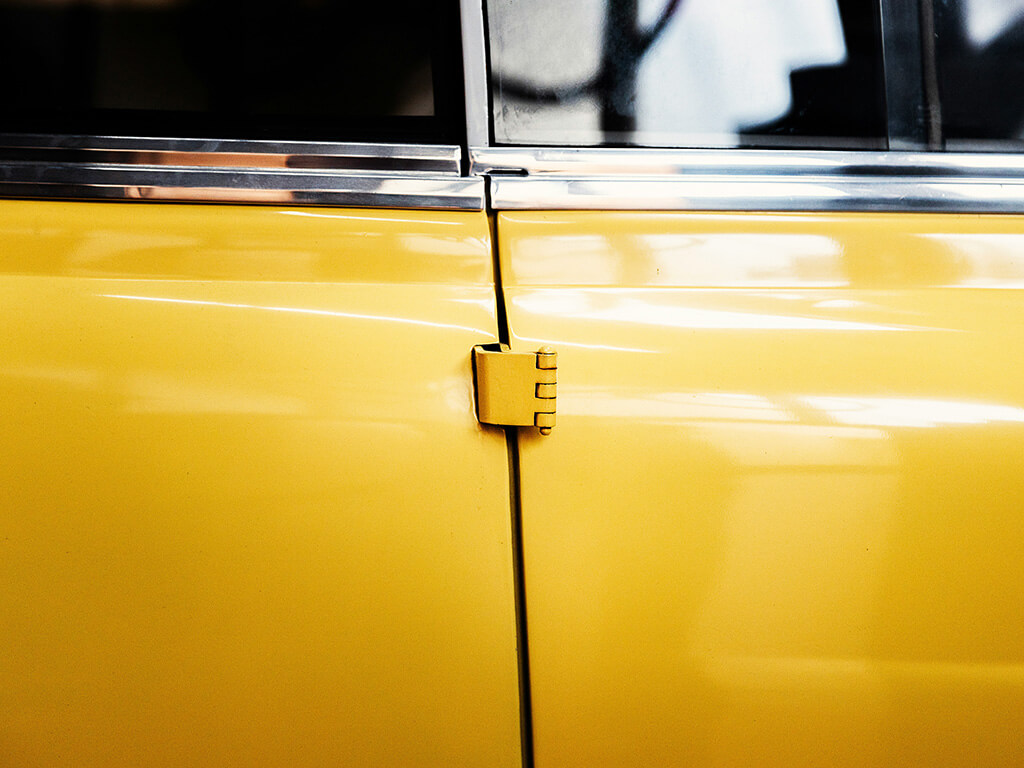 Yellow car door hinges