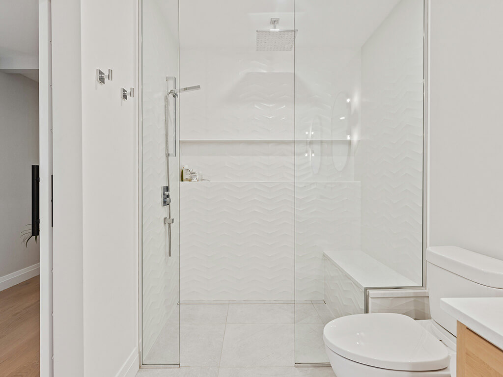 Clean bathroom with clear shower door