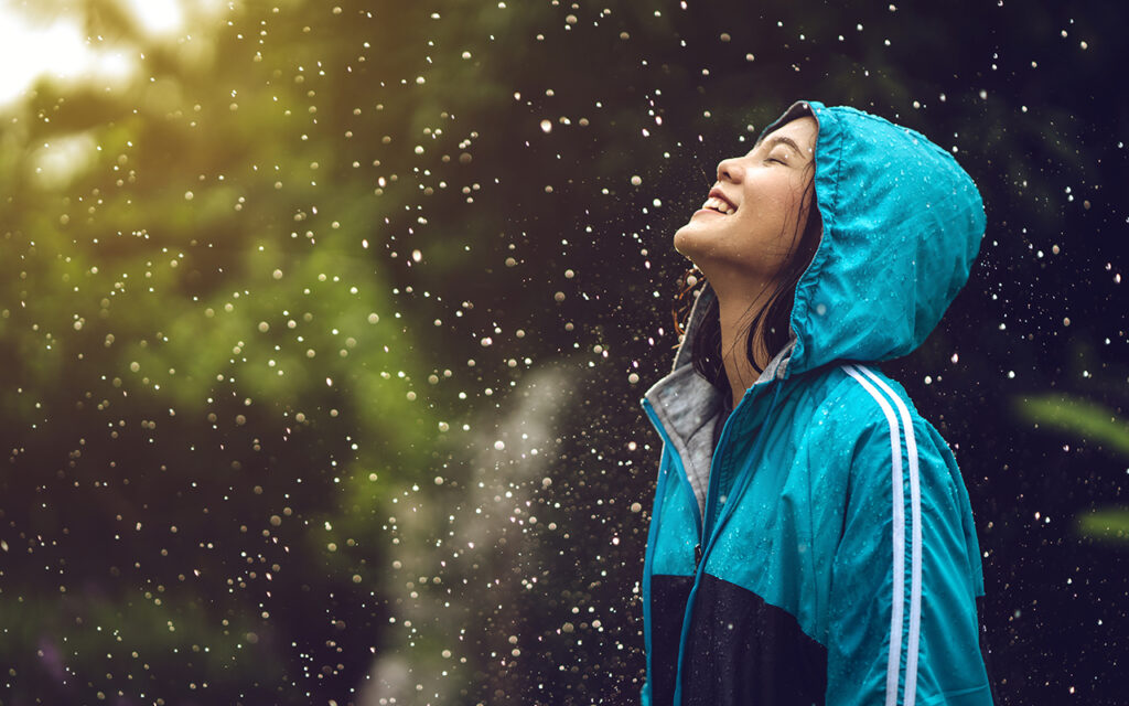 Woman standing in the rain