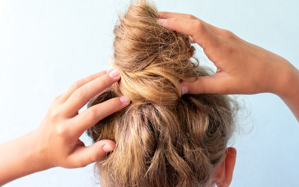 Blonde hair in a bun