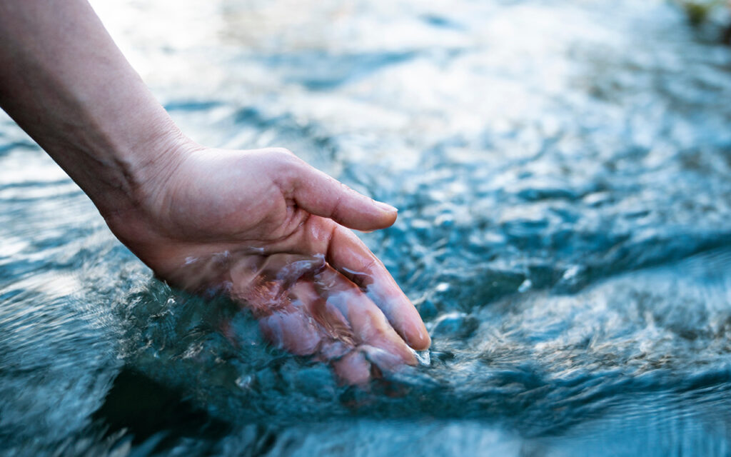 Hand in the ocean