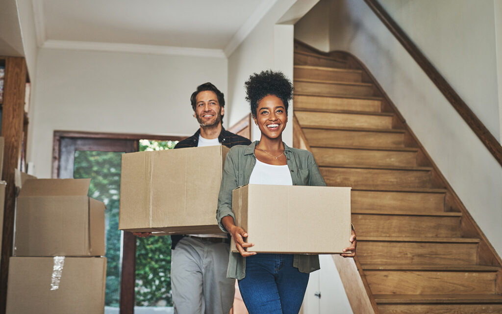 Couple moving into their home